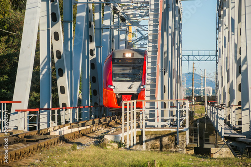 Train passes on bridge