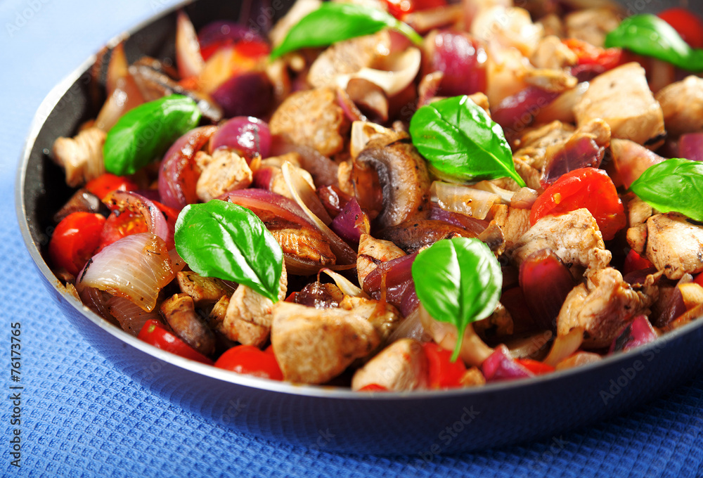 Chicken with onion and cherry tomatos Chicken with onion and cherry tomatos