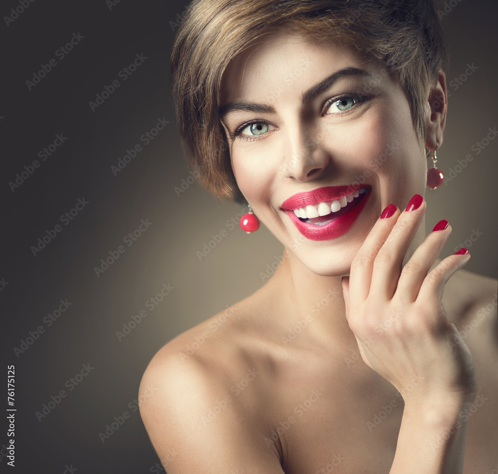 Happy smiling lady with shot brown hair and bright make-up Happy smiling lady with shot brown hair and bright make-up