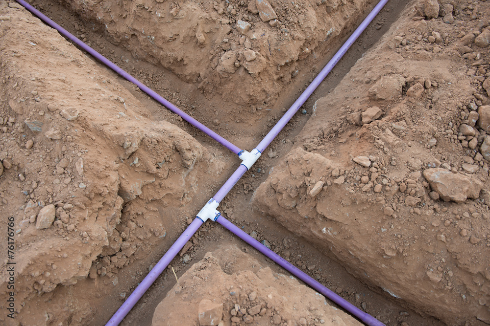 Irrigation pipe in dirt trenches for sprinkler system Stock-Foto | Adobe  Stock