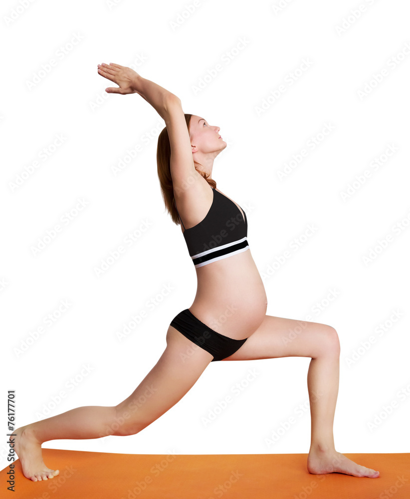 Pregnant woman doing yoga and relaxing Pregnant woman doing yoga and relaxing