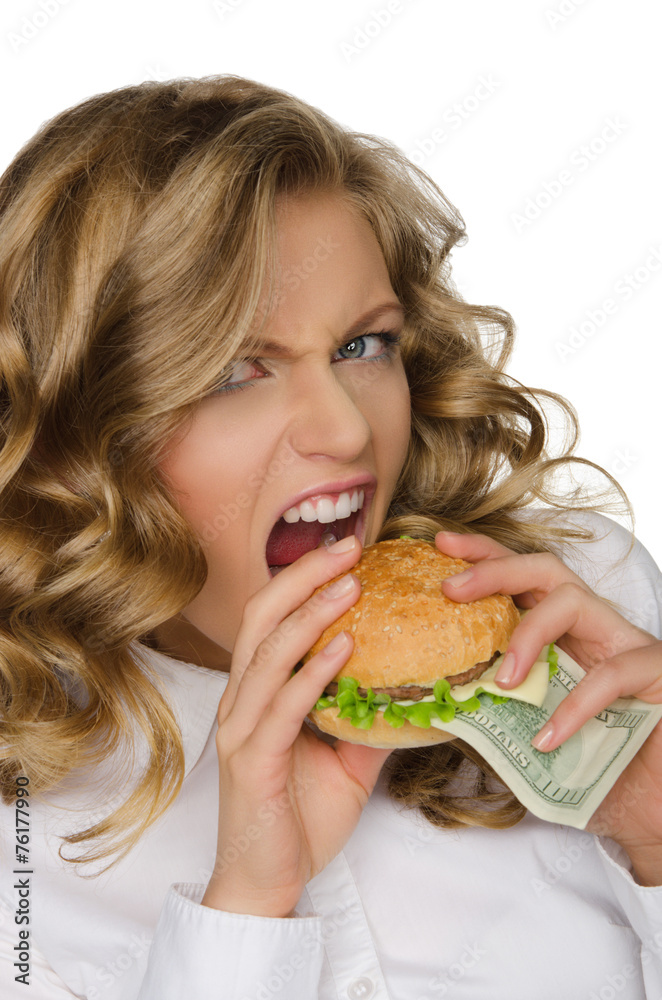 Hungry young woman with burger of dollars