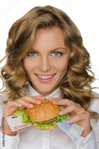 Young woman with hamburger from euro