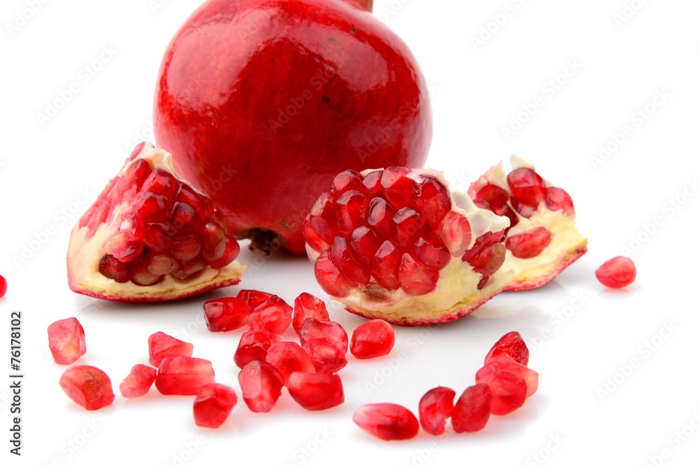 Studio shot open pomegranate isolated white background Studio shot open pomegranate isolated white background