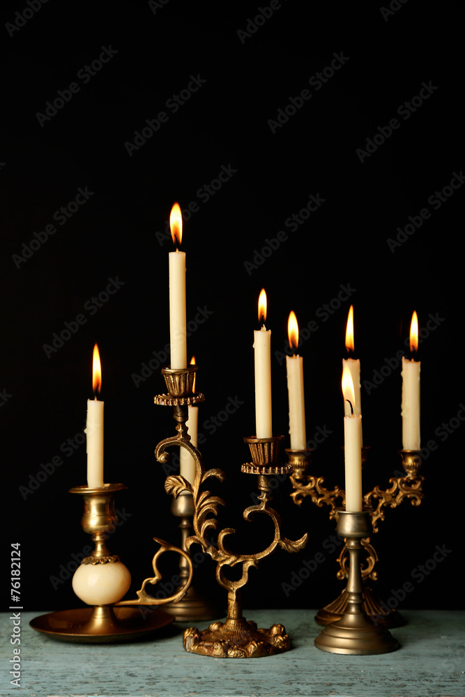 Retro candlesticks with candles Retro candlesticks with candles
