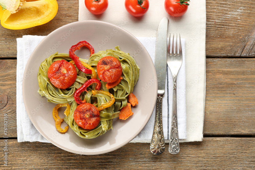 Tasty pasta with pepper, carrot and tomatoes Tasty pasta with pepper, carrot and tomatoes