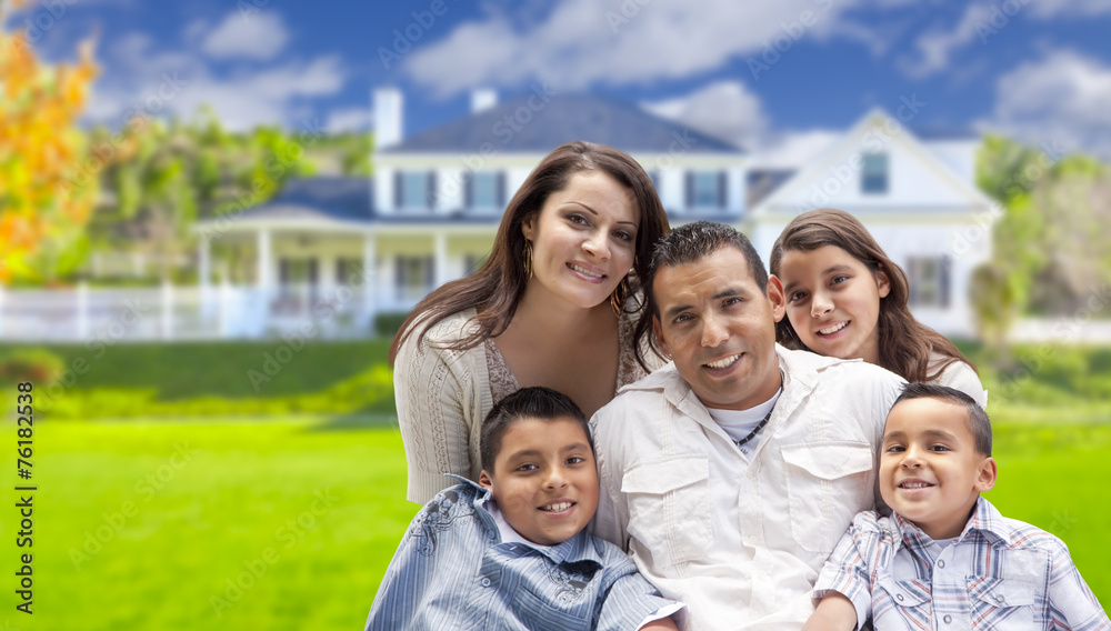 Young Hispanic Family in Front of Their New Home Young Hispanic Family in Front of Their New Home