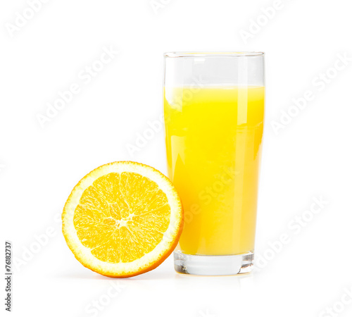 A glass of orange juice on a white background and orange slices