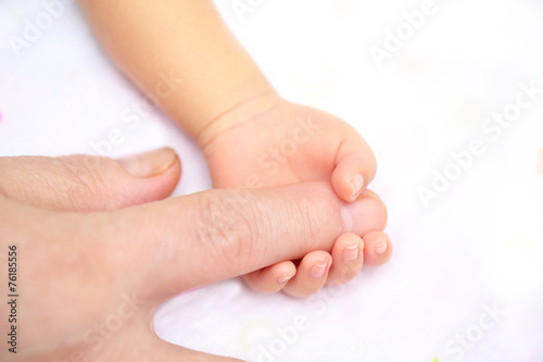 lovely baby with Mam use finger