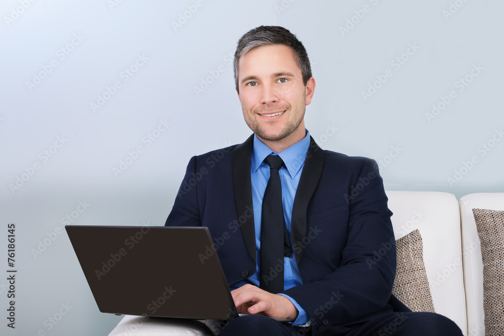 Businessman Using Laptop Businessman Using Laptop