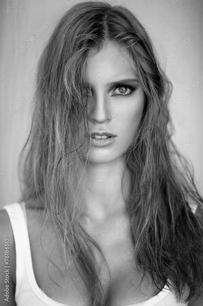 Naklejka premium portrait of blonde woman with fashion makeup and long hair