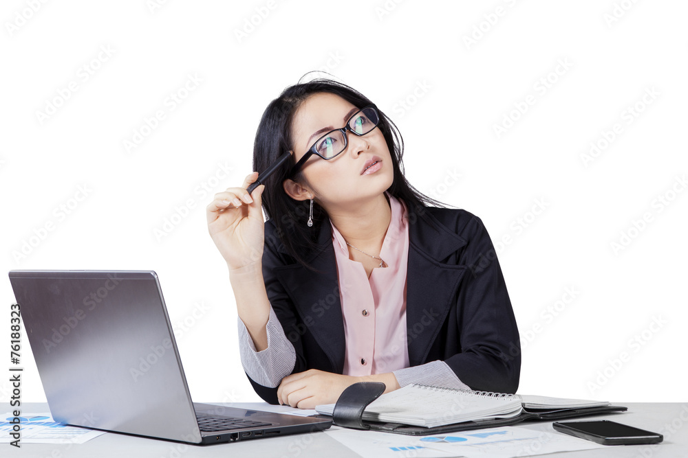 Businesswoman thinking her dreams Businesswoman thinking her dreams