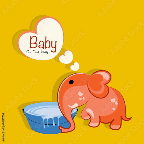 Baby shower concept with cartoon elephant and water tub.