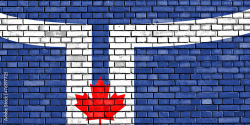 Canvas Print flag of Toronto painted on brick wall