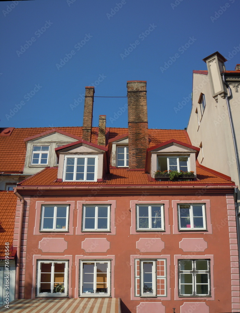 Red roofs, dormers and chimneys (Riga, Latvia)