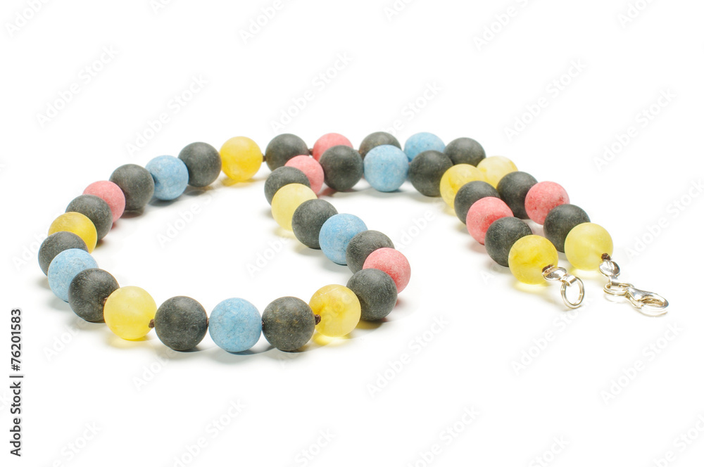 Various color amber necklace isolated with clipping path