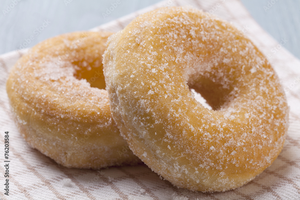 Fresh donut on blue table Fresh donut on blue table