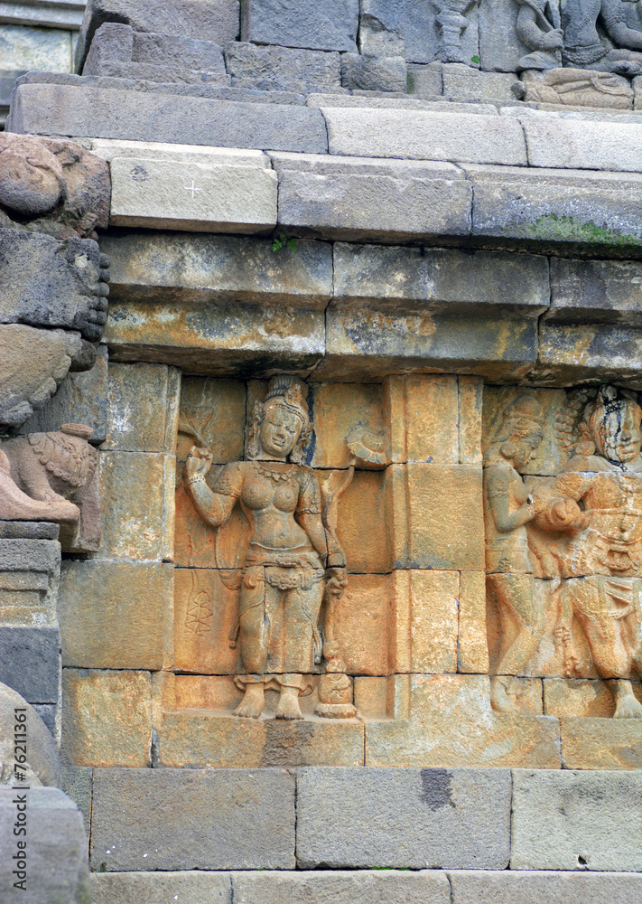 Detail of stone relief taken in Borobudur temple in Yogyakarta