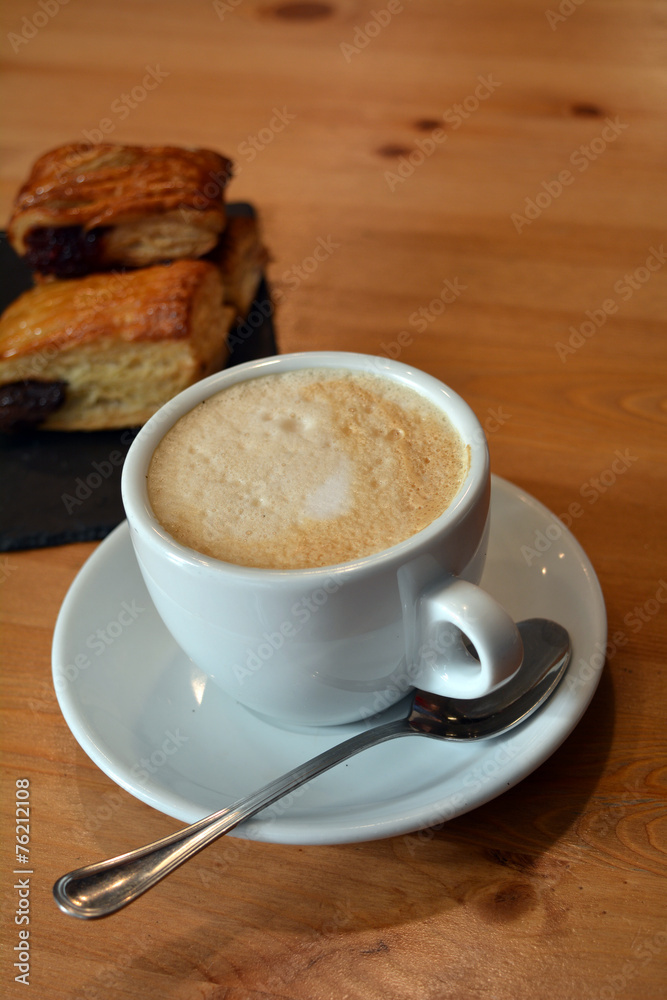 Cappuccino and small pizza on the table Cappuccino and small pizza on the table