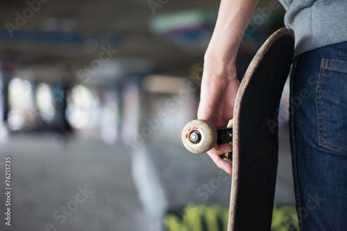 Skateboarder at skate park © jamenpercy