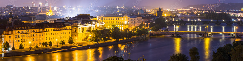 Night panorama view of the Vltava River and the bridges in Pragu