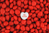 Be Mine Candy on Top of Small Valentine Candies