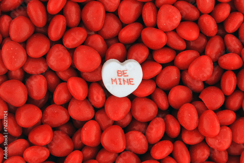 Be Mine Candy on Top of Small Valentine Candies