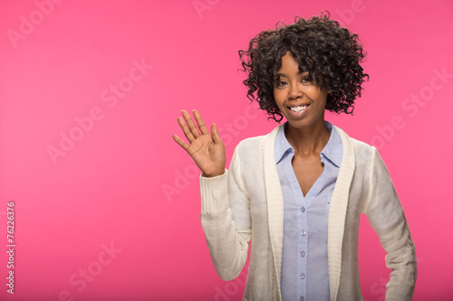 Young African American black woman waving hadn