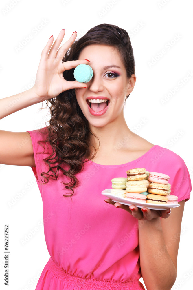 Young beautiful girl with tasty macaroon isolated Young beautiful girl with tasty macaroon isolated