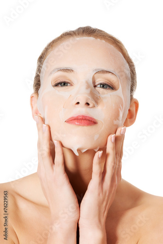 Beautiful woman with collagen mask.