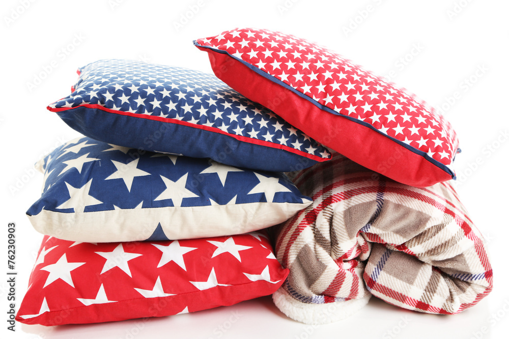 Bright pillows and plaid isolated on white Bright pillows and plaid isolated on white