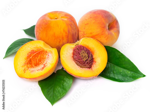 fresh peaches on white background