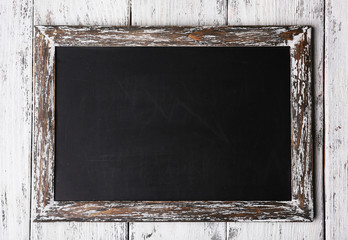 Menu board on color wooden planks background