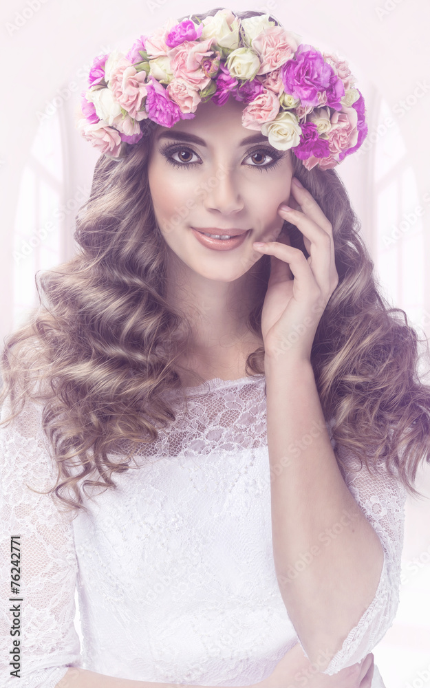 Pretty woman portrait with flowers tiara