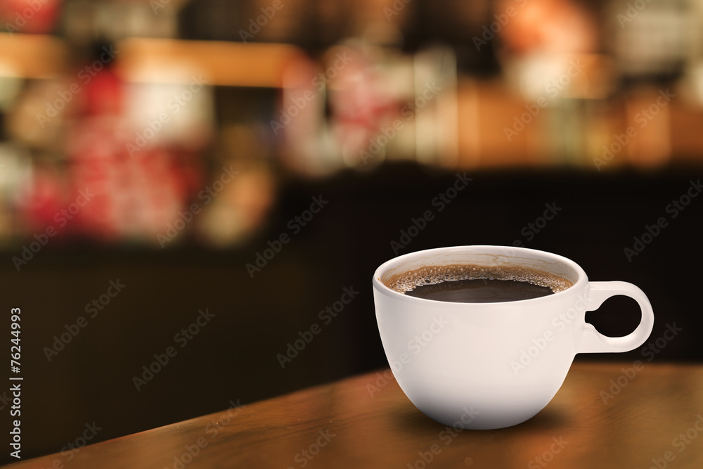 Fototapeta Gorąca filiżanka kawy w kawiarni