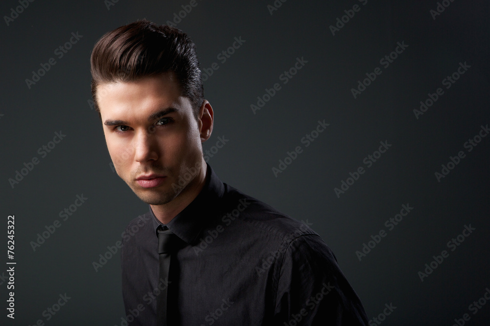 Modern young man with cool hairstyle