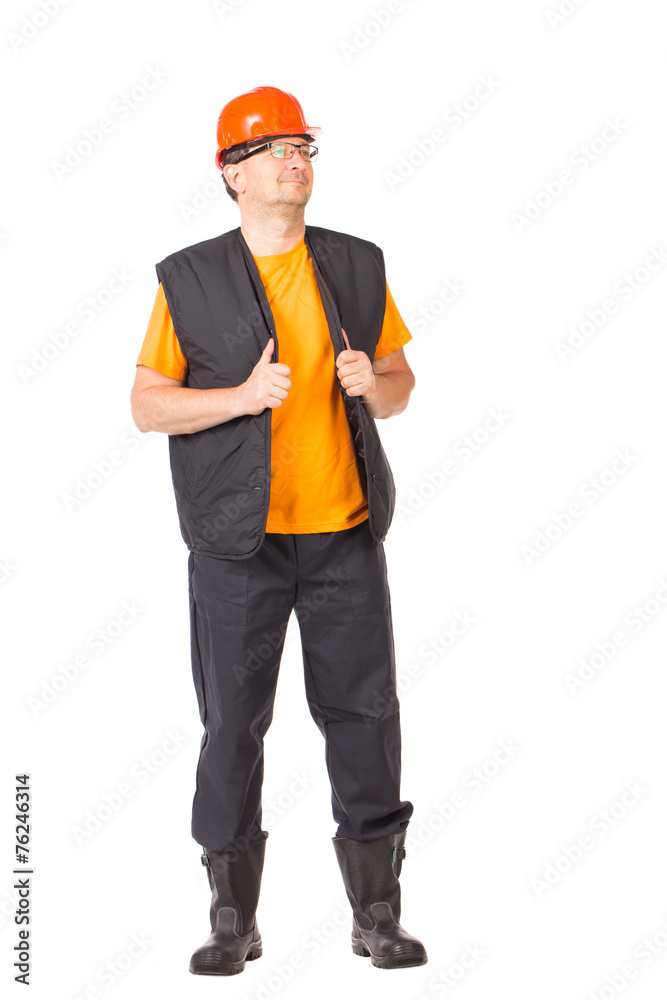 Worker in vest and glasses.