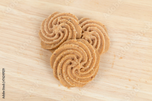 Cookies on wooden table background close up