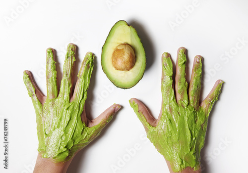 hands with avacado photo