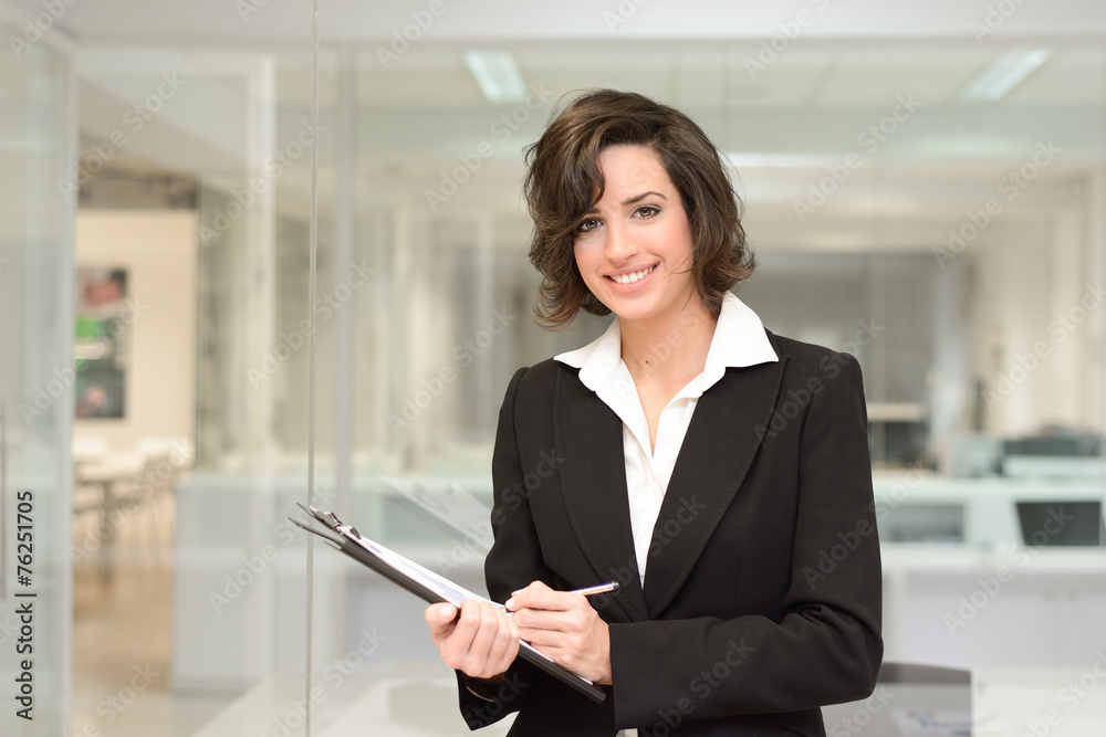 Businesswoman in modern office interior Businesswoman in modern office interior