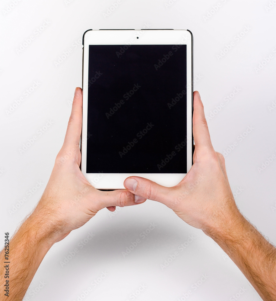 Hands with tablet computer, isolated on white background.