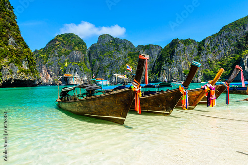 Long-tail boats in Maya Bay, Andaman sea, Thailand, South Asia © davidionut