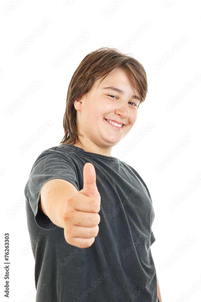 chubby kid or boy smiling and confidently posing with thumb up chubby kid or boy smiling and confidently posing with thumb up