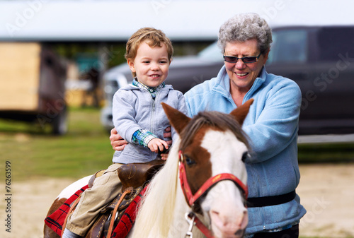 First Pony Ride for a Little Boy