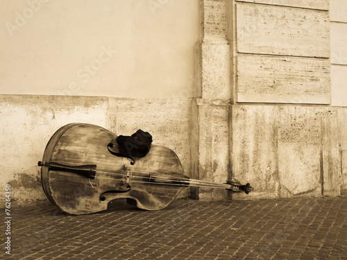 Violoncello or contrabass on the street photo