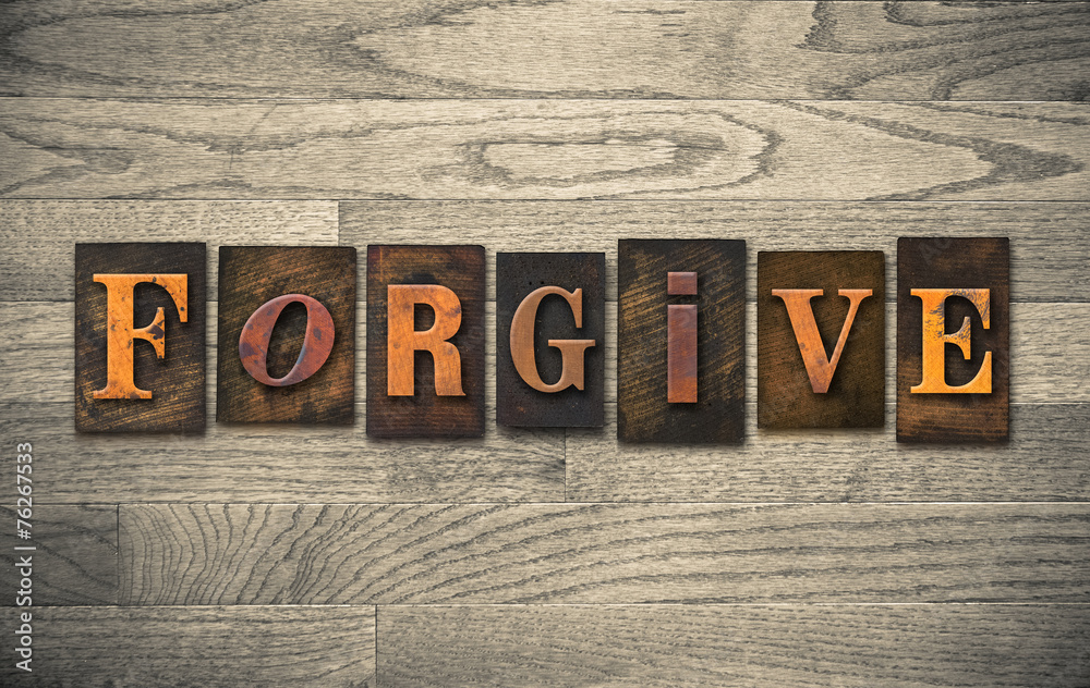 Naklejka premium Forgive Wooden Letterpress Concept