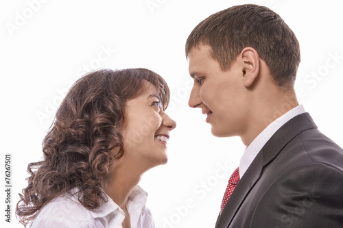 Happy Caucasian Couple Standing Together. Isolated Over Pure Whi