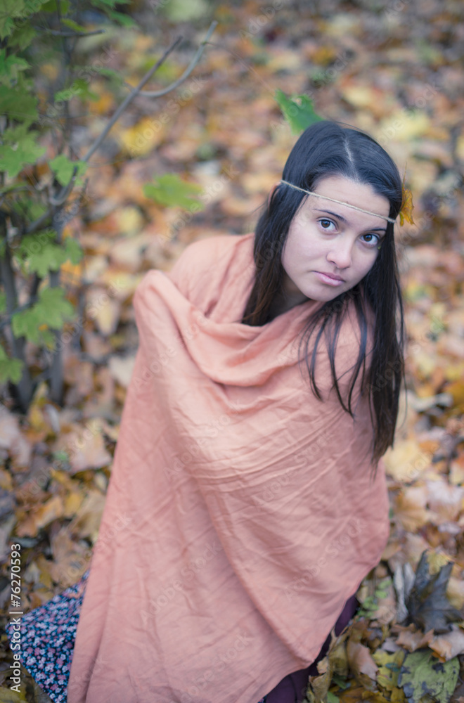 Solitude concept. Sad lonely woman relaxing in romantic autumn Solitude concept. Sad lonely woman relaxing in romantic autumn