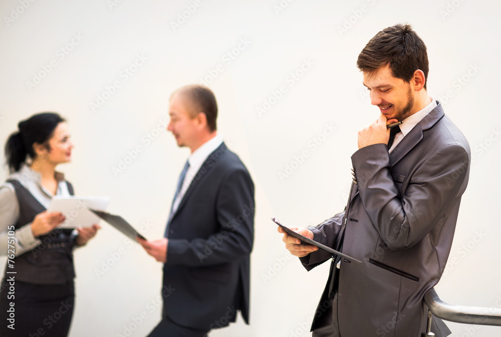 Shady image of a business team discussing Shady image of a business team discussing