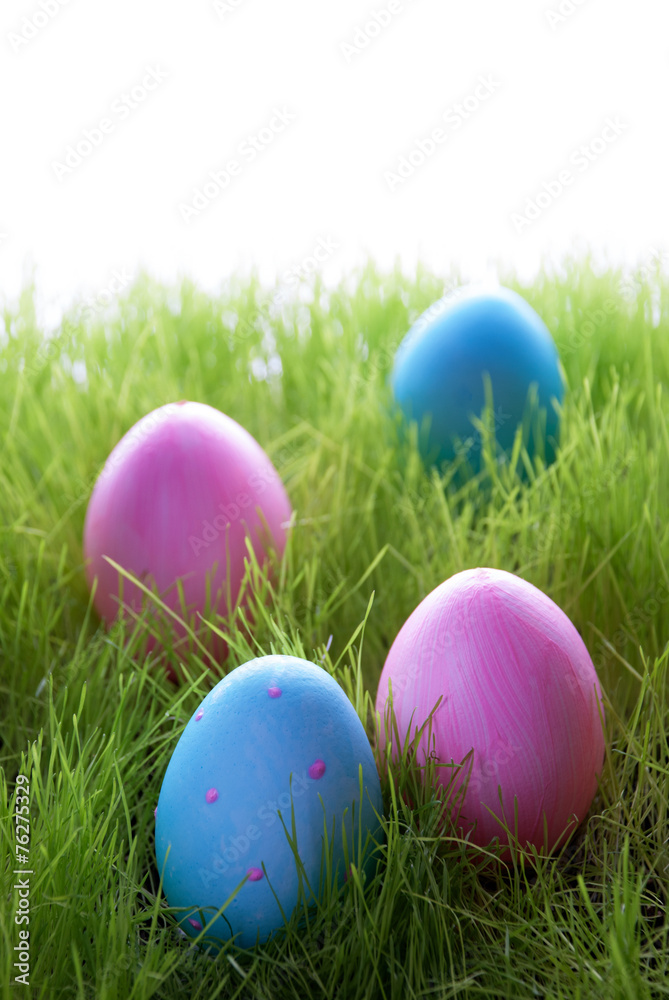 Four Decorative Easter Eggs On Green Grass